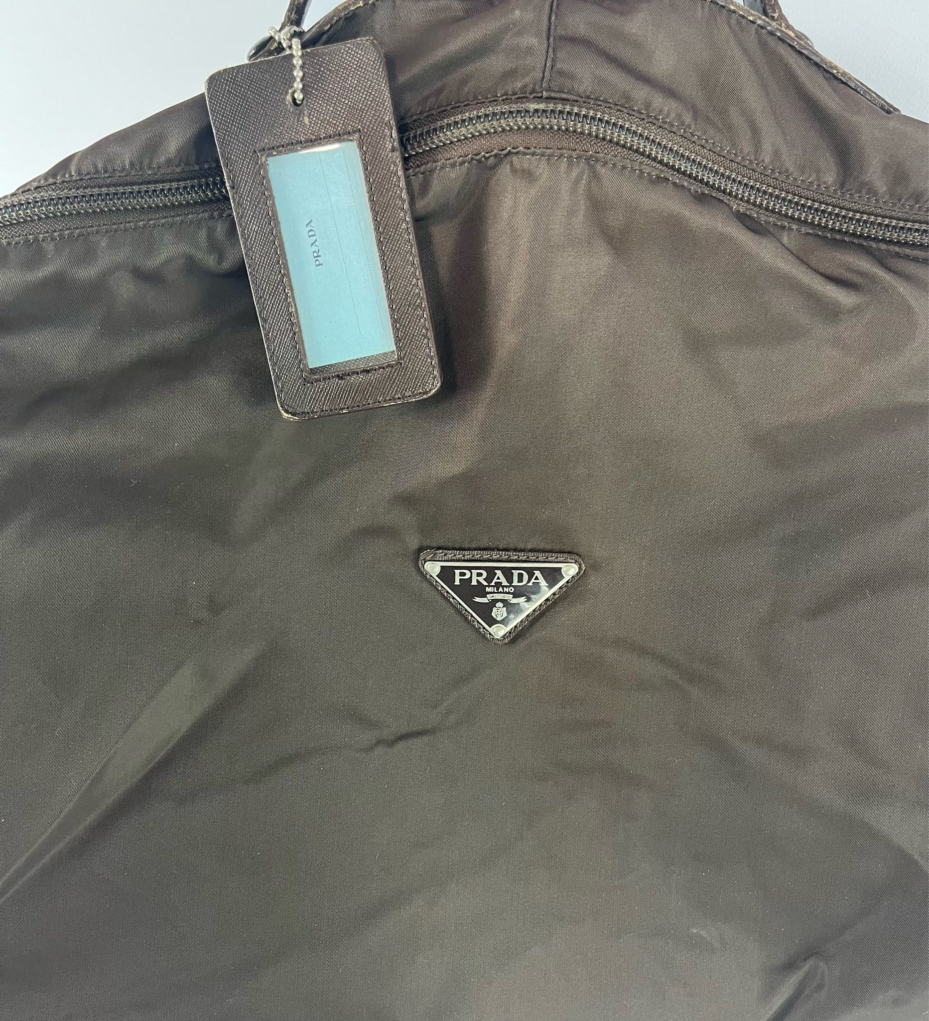 Prada garment bag in brown