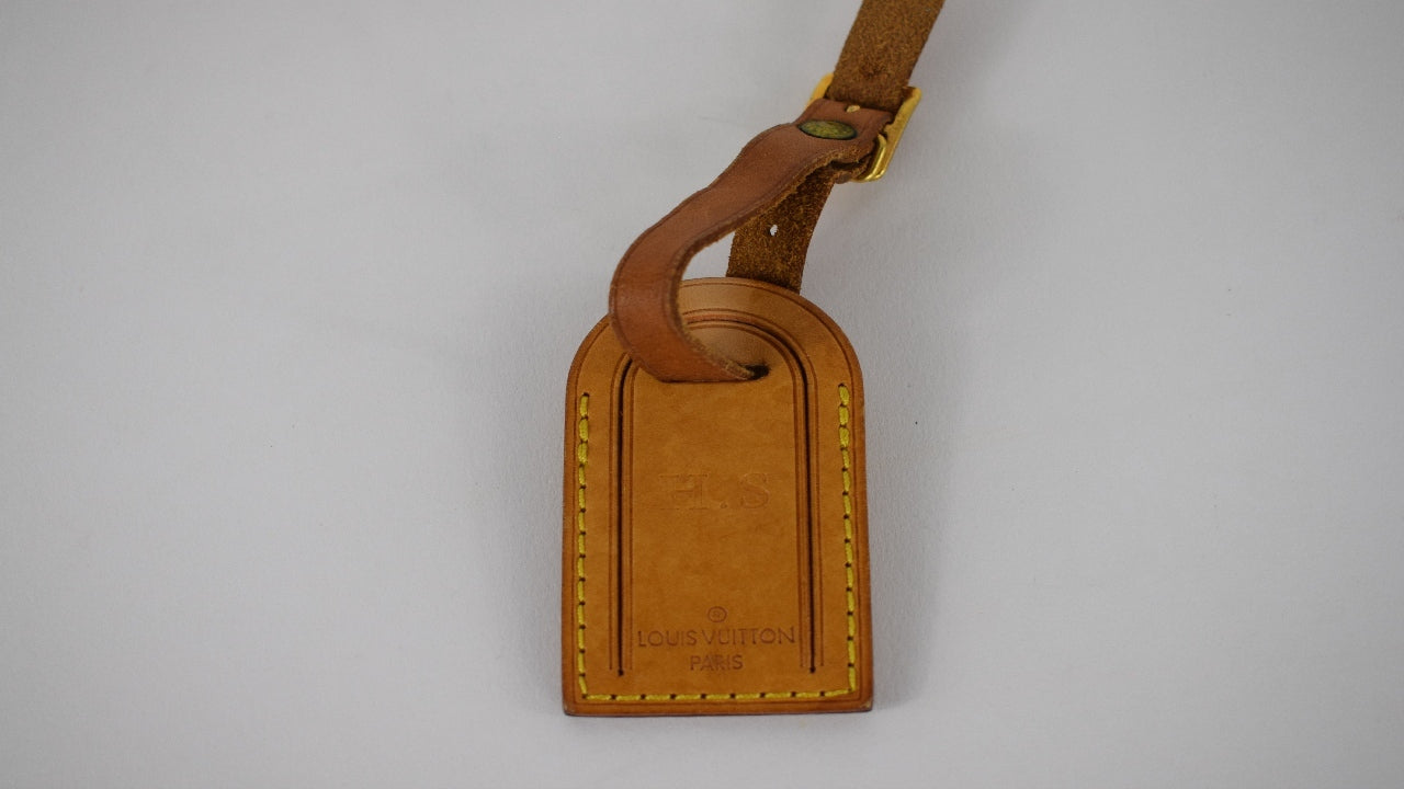 Louis Vuitton brown luggage tag