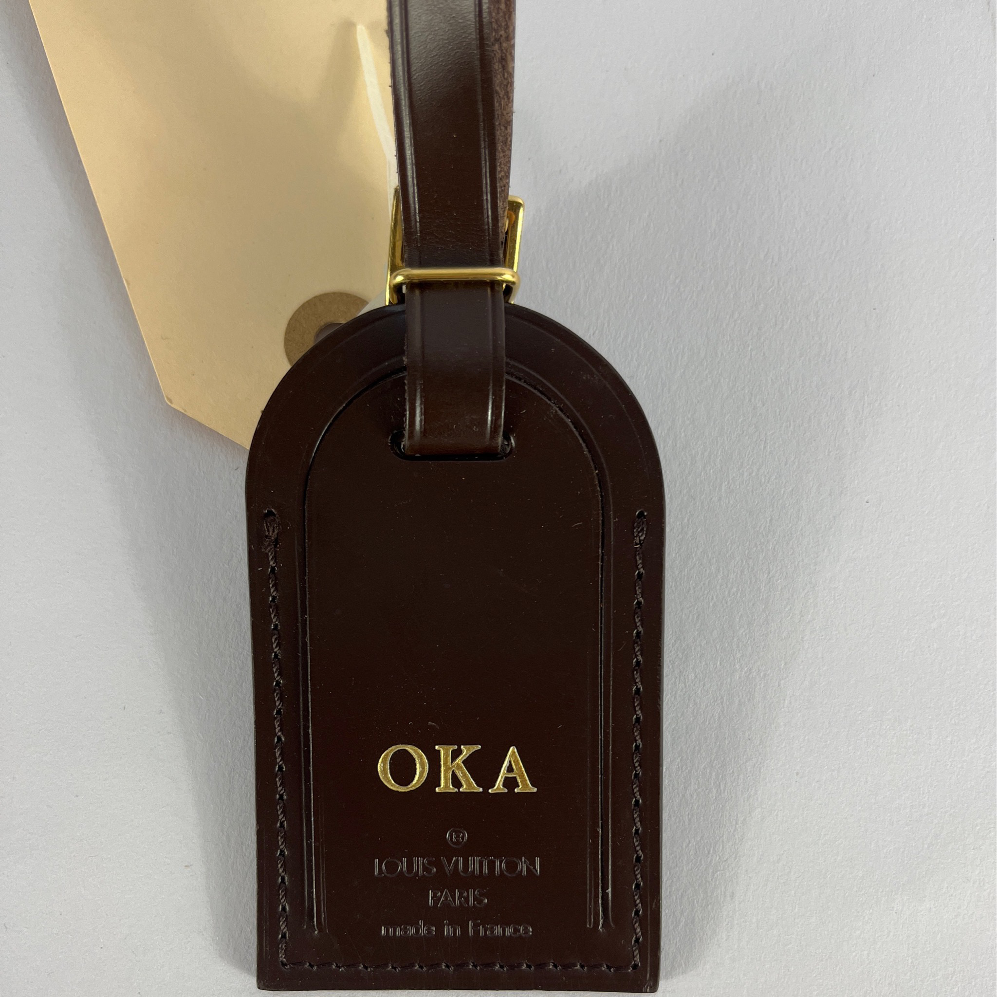 Louis Vuitton dark brown luggage tag